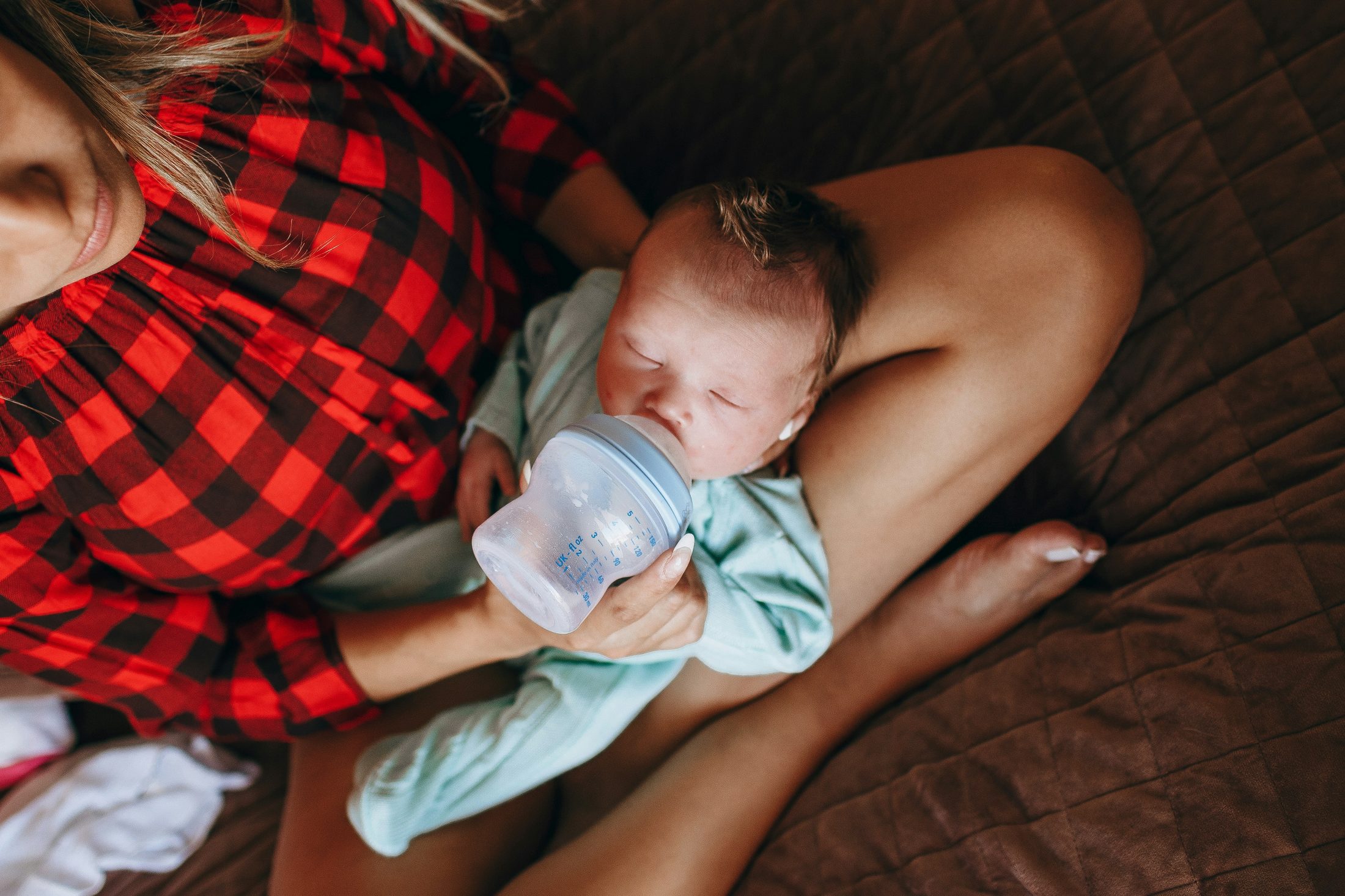 A mum holding her newborn